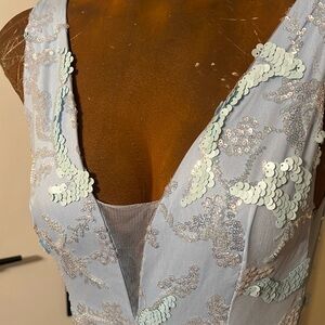 Beautiful light blue, medium dress with sequins. In like new condition